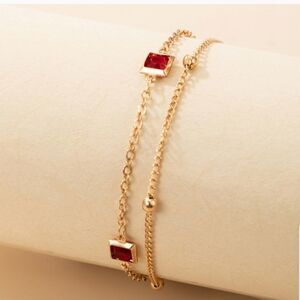 - Gold geometric bracelet